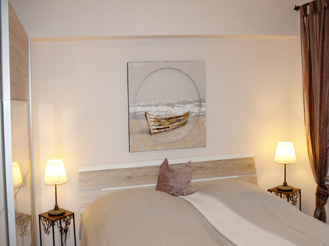 Ferienwohnung in Schönhagen - FerienWohnung Perlentaucher - Schlafzimmer- 180x200 cm Bett und  Kleiderschrank