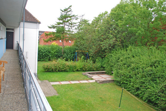 Ferienwohnung in Kellenhusen - Haus Sommerland DG 1 - Ausblick in den schönen großen Garten