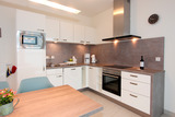 Ferienwohnung in Olpenitz - Residenz Bollwark Typ D - Beispielbild Essbereich mit Küche