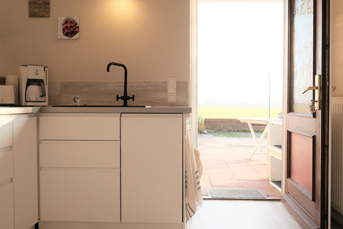 Ferienwohnung in Cismar - Ferienwohnung Oetken - Ausgang zum Hofplatz