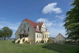 Ferienwohnung 6 direkt am Wasser im Gut Grubnow Rügen